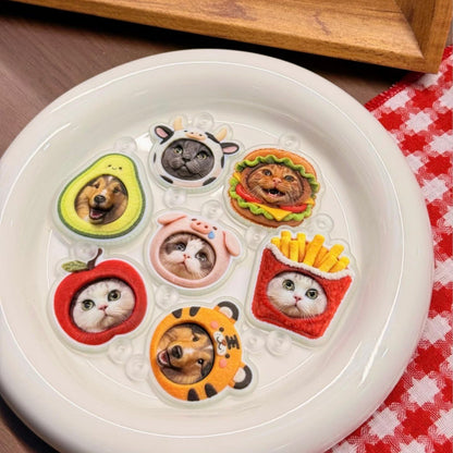 Set of cute animal-shaped cookie cutters on a white plate with a checkered tablecloth in the background.